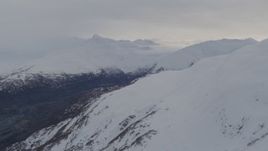 4K aerial stock footage snow capped peaks, approaching river valley, Chugach Mountains, Alaska Aerial Stock Footage | AK0001_0280