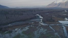4K aerial stock footage descend toward river, towards the Chugach Mountains, Knik River Valley, Alaska Aerial Stock Footage | AK0001_0287