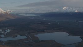 4K aerial stock footage flyby lakes and rivers, bordered by Chugach Mountains, Knik River Valley, Alaska Aerial Stock Footage | AK0001_0298