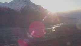 4K aerial stock footage snow capped Chugach Mountain, Butte end of Knik River Valley, Alaska Aerial Stock Footage | AK0001_0300