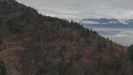 4K aerial stock footage over Chugach Mountain slope, revealing Turnagain Arm of the Cook Inlet, Alaska Aerial Stock Footage | AK0001_0350