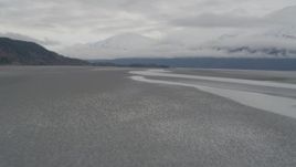 4K aerial stock footage flying low over the water, Turnagain Arm of the Cook Inlet, Alaska Aerial Stock Footage | AK0001_0361