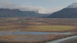 4K aerial stock footage approaching marshland and rivers, Chugach Mountains, Portage, Alaska Aerial Stock Footage | AK0001_0383