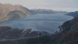 4K aerial stock footage fly over Whittier Airport, approach bay, reveal West Camp Road, Whittier, Alaska Aerial Stock Footage | AK0001_0395
