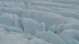 4K aerial stock footage flying low over surface of a glacier, Prince William Sound, Alaska Aerial Stock Footage | AK0001_0438