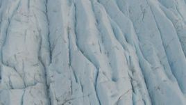 4K aerial stock footage flying low over the surface of a glacier, Prince William Sound, Alaska Aerial Stock Footage | AK0001_0443