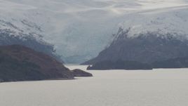 4K aerial stock footage part of a glacier and an island, Blackstone Bay, Alaska Aerial Stock Footage | AK0001_0466