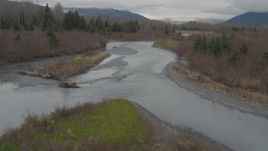 4K aerial stock footage flying along rivers cutting through forest in the valley, Portage, Alaska Aerial Stock Footage | AK0001_0513