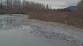 4K aerial stock footage flying low over rivers cutting through the valley, Portage, Alaska Aerial Stock Footage | AK0001_0514