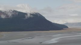 4K aerial stock footage flying by rocky slopes, Kenai Mountains, Alaska Aerial Stock Footage | AK0001_0521
