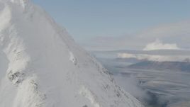 4K aerial stock footage fly around peak, reveal Turnagain Arm of the Cook Inlet, Kenai Mountains, Alaska Aerial Stock Footage | AK0001_0527