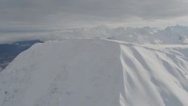 4K aerial stock footage orbiting snowy mountain peak, Kenai Mountains, Alaska Aerial Stock Footage | AK0001_0529