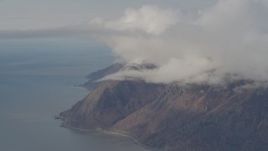 4K aerial stock footage flying by Turnagain Arm of the Cook Inlet, bordered by Chugach Mountains, Alaska Aerial Stock Footage | AK0001_0552