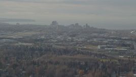 4K aerial stock footage flying by Merrill Field and Downtown Anchorage, Alaska Aerial Stock Footage | AK0001_0580