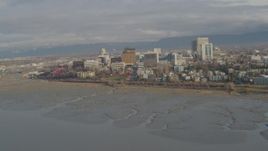 4K aerial stock footage flying by Downtown from Knik Arm of the Cook Inlet, Downtown Anchorage, Alaska Aerial Stock Footage | AK0001_0591