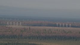 4K aerial stock footage flying by power lines, forests, Point MacKenzie, Alaska Aerial Stock Footage | AK0001_0594