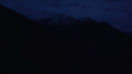 4K aerial stock footage flying by communications tower, Chugach Mountains, Anchorage, Alaska, sunrise Aerial Stock Footage | AK0001_0606