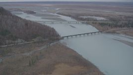 4K aerial stock footage the Glenn Highway Bridge, train bridge, spanning the Knik River, Alaska Aerial Stock Footage | AK0001_0621