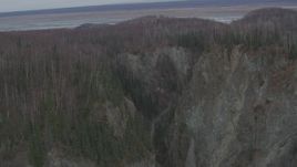 4K aerial stock footage flying over deep river gorge, forests, approaching river valley, Birchwood, Alaska Aerial Stock Footage | AK0001_0627
