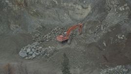 4K aerial stock footage orbiting an excavator working on a hillside, Chugiak, Alaska Aerial Stock Footage | AK0001_0656