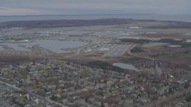 4K aerial stock footage Lake Hood Seaplane Base, Ted Stevens Anchorage International Airport, Anchorage, Alaska Aerial Stock Footage | AK0001_0677