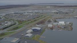 4K aerial stock footage Lake Hood Seaplane Base, Ted Stevens Anchorage International Airport, Anchorage, Alaska Aerial Stock Footage | AK0001_0680