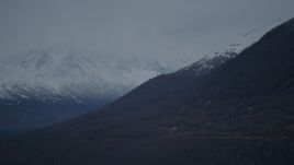 4K aerial stock footage a view of rural homes and snow-capped Chugach Mountains, Alaska Aerial Stock Footage | AK0001_0716