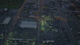 4K aerial stock footage following East 6th Street, revealing Downtown Anchorage, Alaska, twilight Aerial Stock Footage | AK0001_0727