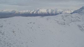 4K aerial stock footage approach a snowy ridge in the Chugach Mountains, Alaska Aerial Stock Footage | AK0001_0777