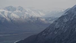 4K aerial stock footage rounding mountain slope, revealing Knik River Valley, Chugach Mountains, Alaska Aerial Stock Footage | AK0001_0786