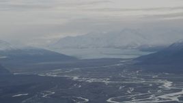 4K aerial stock footage Knik Glacier, snowy Chugach Mountains, Swan Lake, Knik River Valley, Alaska Aerial Stock Footage | AK0001_0789