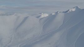 4K aerial stock footage approaching snowy ridge, Chugach Mountains, Alaska Aerial Stock Footage | AK0001_0821
