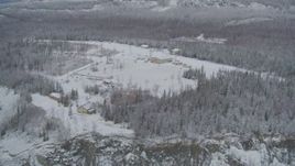 4K aerial stock footage flyby King Ranch, reveal snowy Matanuska River Valley, Sutton, Alaska Aerial Stock Footage | AK0001_0860