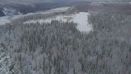 4K aerial stock footage descend to snowy runway, King Ranch, Matanuska River Valley, Sutton, Alaska Aerial Stock Footage | AK0001_0861