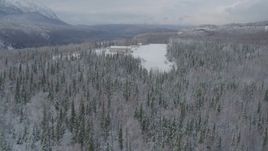 4K aerial stock footage descend toward snowy runway, King Ranch, Sutton, Alaska Aerial Stock Footage | AK0001_0863