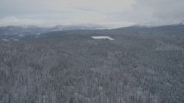 4K aerial stock footage approaching Bench Lake, snow-capped mountains, Matanuska River Valley, Alaska Aerial Stock Footage | AK0001_0868