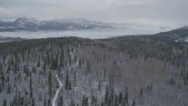4K aerial stock footage approaching snow-covered mountains beyond the Matanuska Glacier, Alaska Aerial Stock Footage | AK0001_0872