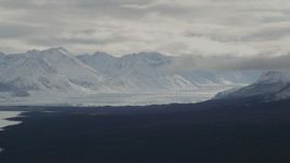 4K aerial stock footage Tazlina Glacier in snow-covered Chugach Mountains near Tazlina Lake, Alaska Aerial Stock Footage | AK0001_0910