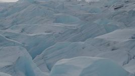 4K aerial stock footage flying over snow covered surface of the Tazlina Glacier, Alaska Aerial Stock Footage | AK0001_0921