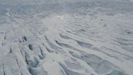 4K aerial stock footage flying over snow covered surface of the Tazlina Glacier, Alaska Aerial Stock Footage | AK0001_0924