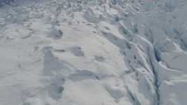 4K aerial stock footage flying over snow covered surface of the Tazlina Glacier, Alaska Aerial Stock Footage | AK0001_0927