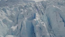 4K aerial stock footage flying over snow covered surface of the Tazlina Glacier, Alaska Aerial Stock Footage | AK0001_0929