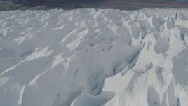 4K aerial stock footage flying over snow covered surface of the Tazlina Glacier, Alaska Aerial Stock Footage | AK0001_0932