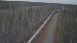4K aerial stock footage pan across the pipeline during winter, Trans-Alaska Pipeline, Alaska Aerial Stock Footage | AK0001_0998
