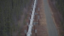 4K aerial stock footage flying over the Trans-Alaska Pipeline, Alaska in winter Aerial Stock Footage | AK0001_1003