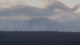 4K aerial stock footage a snow covered Talkeetna Mountain peak, Alaskan Wilderness Aerial Stock Footage | AK0001_1048