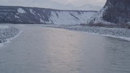 4K aerial stock footage flying over the Matanuska River and snow covered bank, Alaska Aerial Stock Footage | AK0001_1080