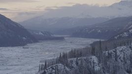 4K aerial stock footage snowy Talkeetna Mountains beside snowy Matanuska River Valley, Alaska Aerial Stock Footage | AK0001_1093