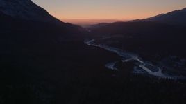 4K aerial stock footage flying over the snow covered Matanuska River Valley at sunset, Alaska Aerial Stock Footage | AK0001_1109