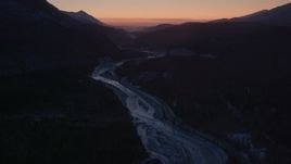 4K aerial stock footage video flying over the snow covered Matanuska River Valley at sunset, Alaska Aerial Stock Footage | AK0001_1110
